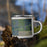 Right View Custom Oakes North Dakota Map Enamel Mug in Afternoon on Grass With Trees in Background
