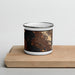 Front View Custom Oakland California Map Enamel Mug in Ember on Cutting Board