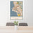 24x36 Oakland California Map Print Portrait Orientation in Woodblock Style Behind 2 Chairs Table and Potted Plant