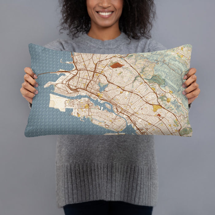 Person holding 20x12 Custom Oakland California Map Throw Pillow in Woodblock