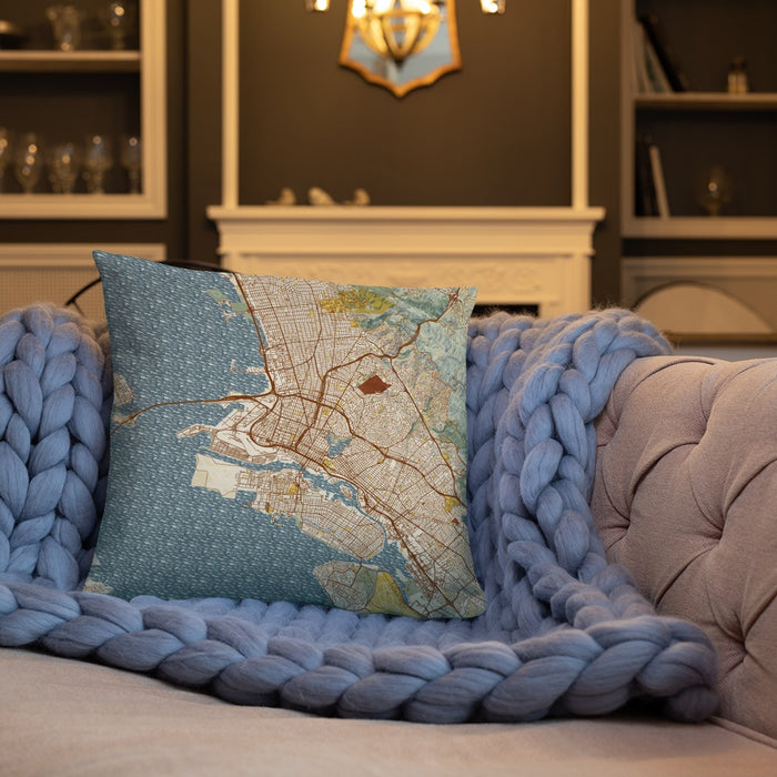 Custom Oakland California Map Throw Pillow in Woodblock on Cream Colored Couch