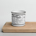 Front View Custom Oakley California Map Enamel Mug in Classic on Cutting Board