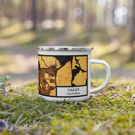 Right View Custom Oakley California Map Enamel Mug in Ember on Grass With Trees in Background