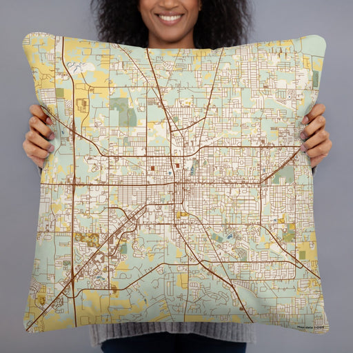 Person holding 22x22 Custom Ocala Florida Map Throw Pillow in Woodblock