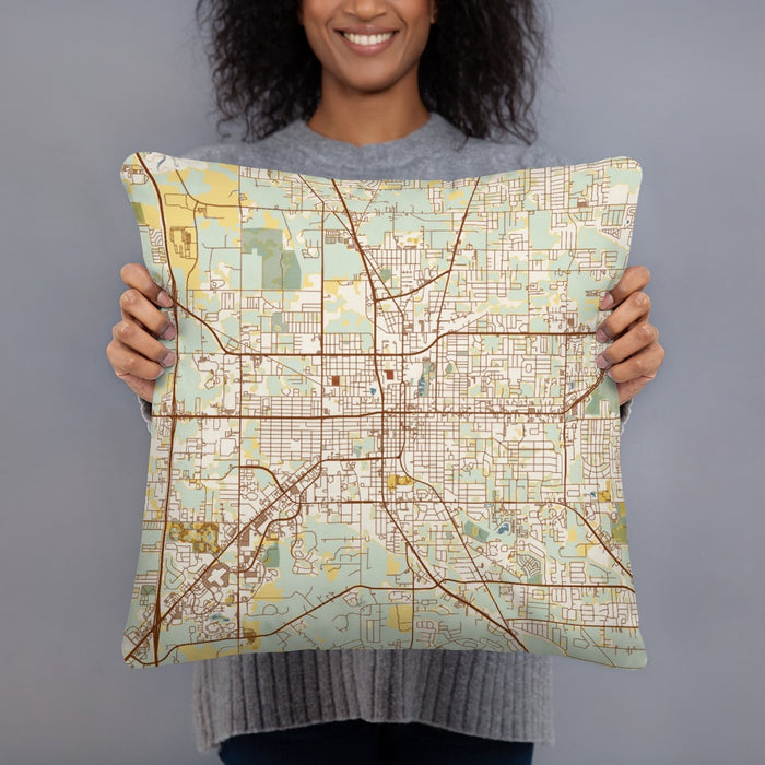 Person holding 18x18 Custom Ocala Florida Map Throw Pillow in Woodblock