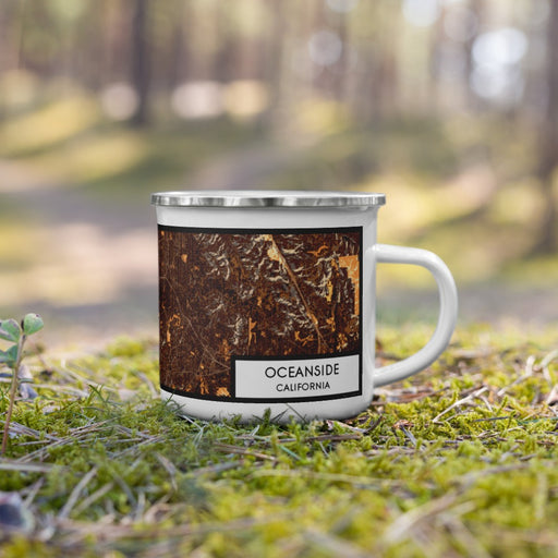 Right View Custom Oceanside California Map Enamel Mug in Ember on Grass With Trees in Background
