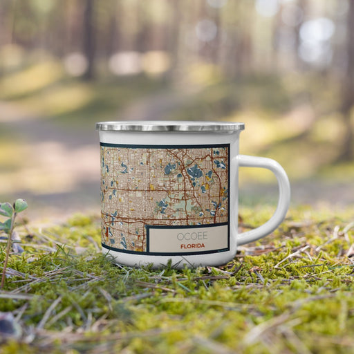Right View Custom Ocoee Florida Map Enamel Mug in Woodblock on Grass With Trees in Background