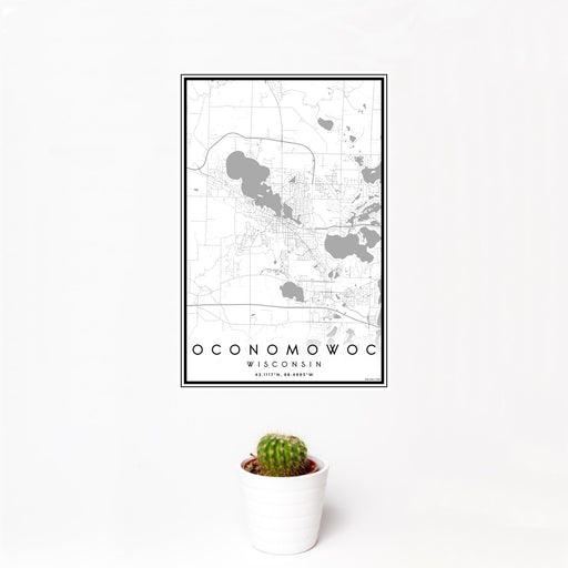 12x18 Oconomowoc Wisconsin Map Print Portrait Orientation in Classic Style With Small Cactus Plant in White Planter