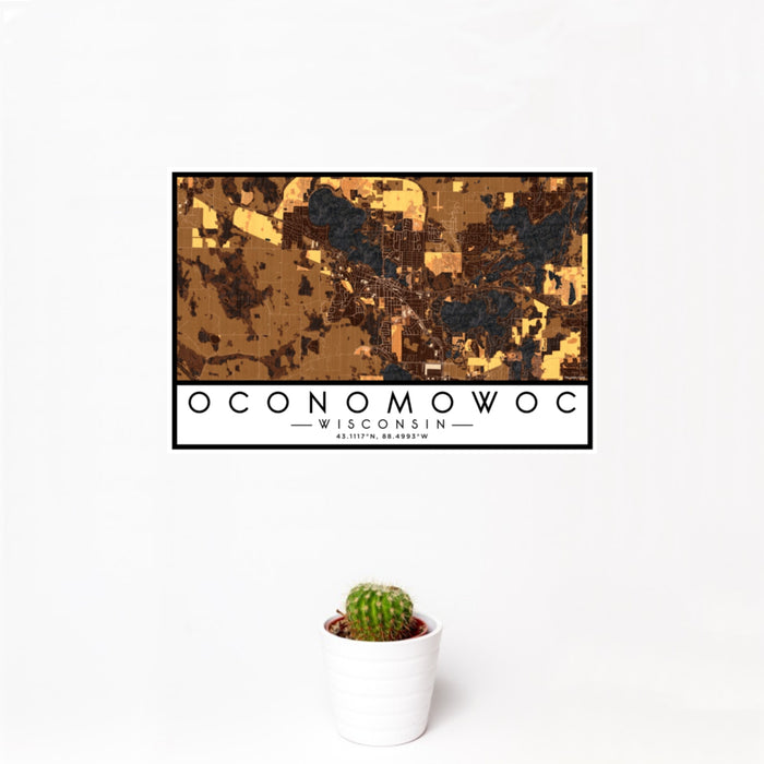 12x18 Oconomowoc Wisconsin Map Print Landscape Orientation in Ember Style With Small Cactus Plant in White Planter