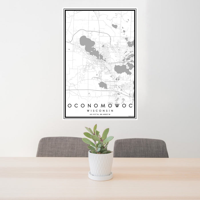 24x36 Oconomowoc Wisconsin Map Print Portrait Orientation in Classic Style Behind 2 Chairs Table and Potted Plant