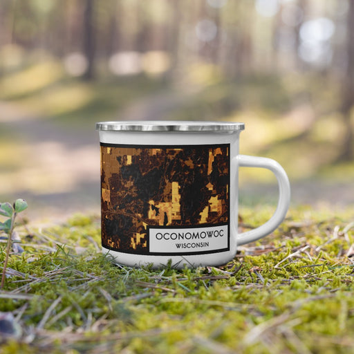 Right View Custom Oconomowoc Wisconsin Map Enamel Mug in Ember on Grass With Trees in Background