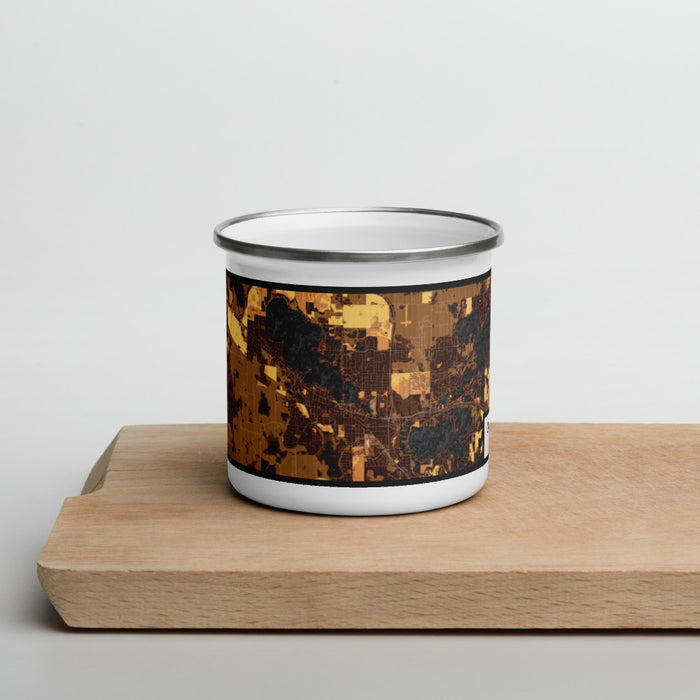Front View Custom Oconomowoc Wisconsin Map Enamel Mug in Ember on Cutting Board