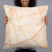 Person holding 22x22 Custom Odessa Texas Map Throw Pillow in Watercolor