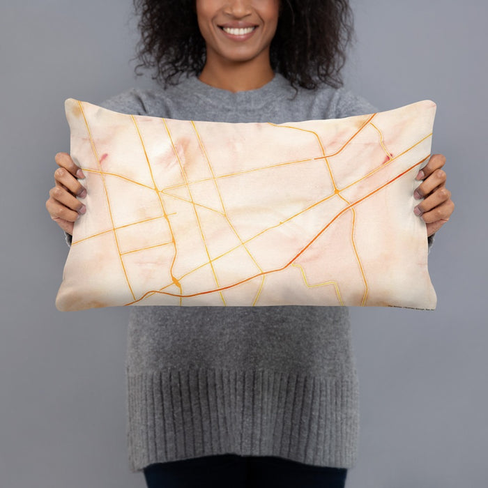 Person holding 20x12 Custom Odessa Texas Map Throw Pillow in Watercolor