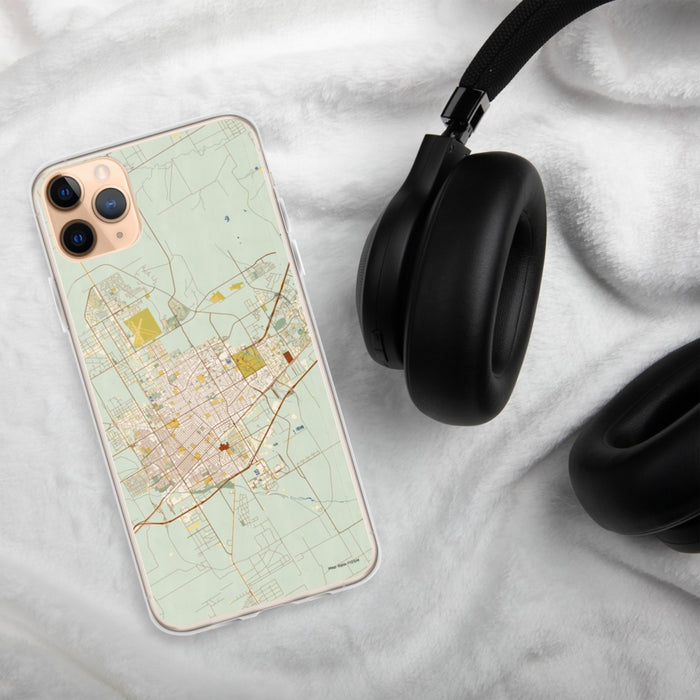 Custom Odessa Texas Map Phone Case in Woodblock on Table with Black Headphones