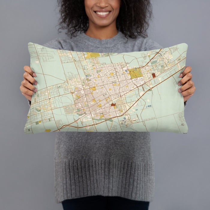 Person holding 20x12 Custom Odessa Texas Map Throw Pillow in Woodblock