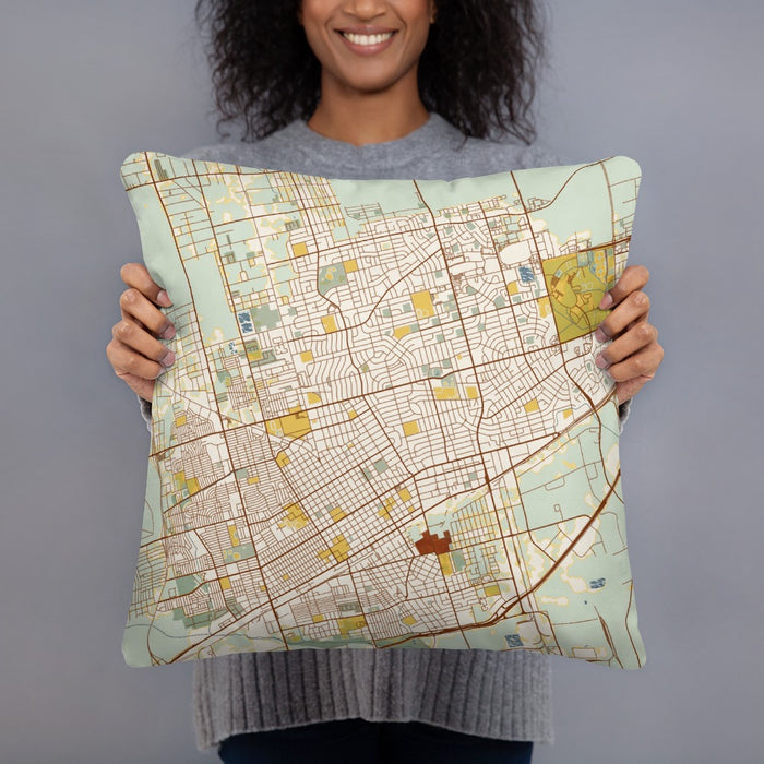 Person holding 18x18 Custom Odessa Texas Map Throw Pillow in Woodblock