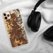 Custom Ogden Utah Map Phone Case in Ember on Table with Black Headphones