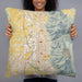 Person holding 22x22 Custom Ogden Utah Map Throw Pillow in Woodblock