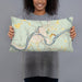 Person holding 20x12 Custom Oil City Pennsylvania Map Throw Pillow in Woodblock