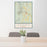 24x36 Okemo Vermont Map Print Portrait Orientation in Woodblock Style Behind 2 Chairs Table and Potted Plant