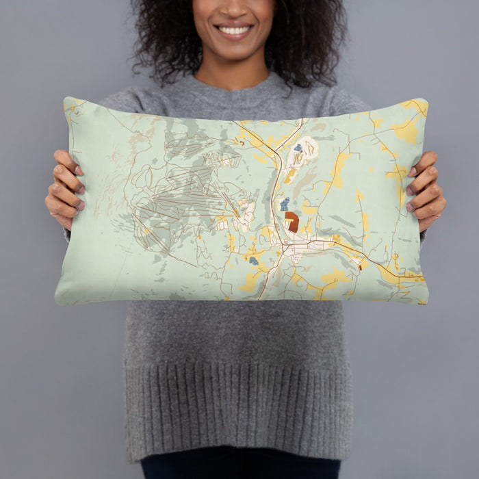 Person holding 20x12 Custom Okemo Vermont Map Throw Pillow in Woodblock