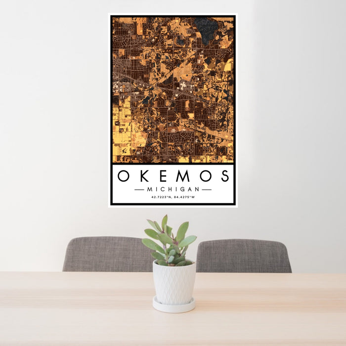 24x36 Okemos Michigan Map Print Portrait Orientation in Ember Style Behind 2 Chairs Table and Potted Plant