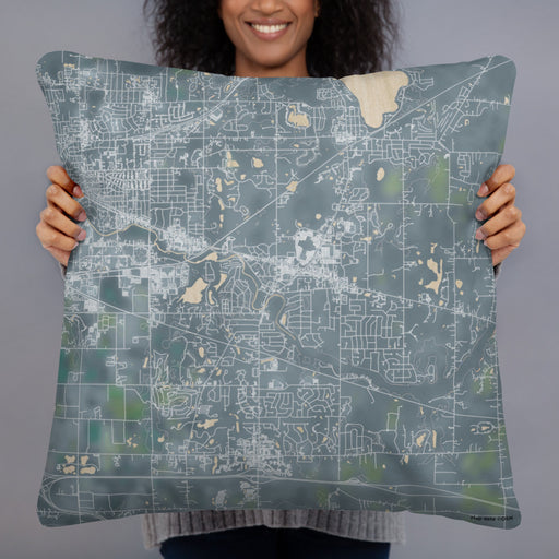 Person holding 22x22 Custom Okemos Michigan Map Throw Pillow in Afternoon