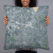 Person holding 22x22 Custom Okemos Michigan Map Throw Pillow in Afternoon