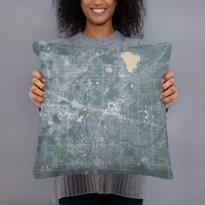 Person holding 18x18 Custom Okemos Michigan Map Throw Pillow in Afternoon