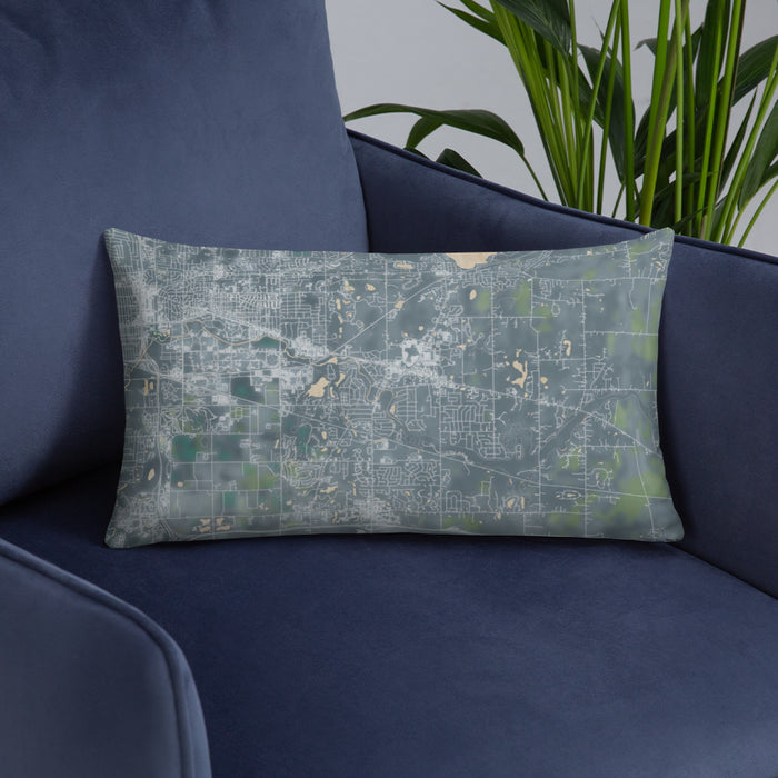 Custom Okemos Michigan Map Throw Pillow in Afternoon on Blue Colored Chair