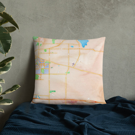 Custom Okemos Michigan Map Throw Pillow in Watercolor on Bedding Against Wall