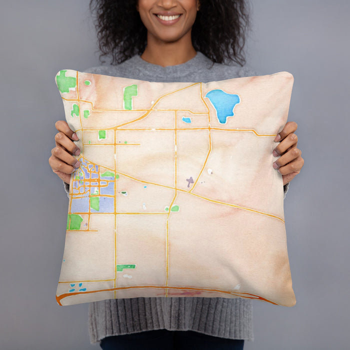 Person holding 18x18 Custom Okemos Michigan Map Throw Pillow in Watercolor