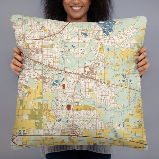 Person holding 22x22 Custom Okemos Michigan Map Throw Pillow in Woodblock
