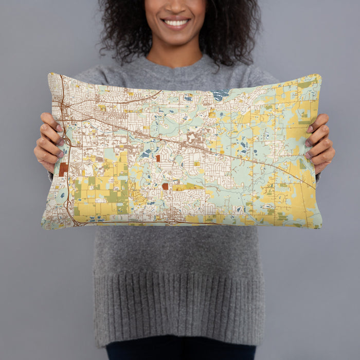 Person holding 20x12 Custom Okemos Michigan Map Throw Pillow in Woodblock