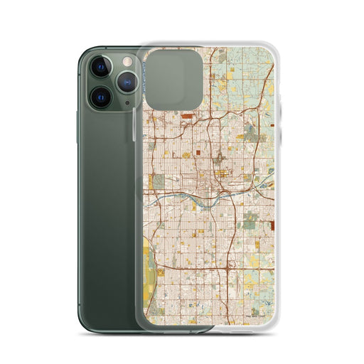 Custom Oklahoma City Oklahoma Map Phone Case in Woodblock on Table with Laptop and Plant
