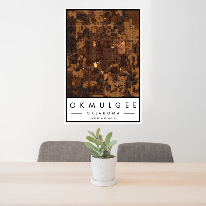 24x36 Okmulgee Oklahoma Map Print Portrait Orientation in Ember Style Behind 2 Chairs Table and Potted Plant