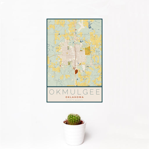 12x18 Okmulgee Oklahoma Map Print Portrait Orientation in Woodblock Style With Small Cactus Plant in White Planter