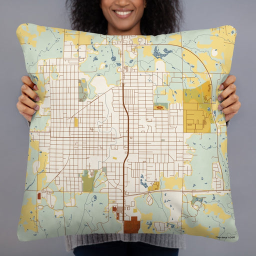 Person holding 22x22 Custom Okmulgee Oklahoma Map Throw Pillow in Woodblock