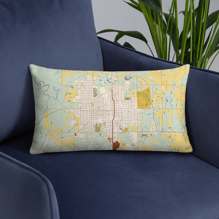 Custom Okmulgee Oklahoma Map Throw Pillow in Woodblock on Blue Colored Chair