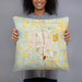 Person holding 18x18 Custom Okmulgee Oklahoma Map Throw Pillow in Woodblock