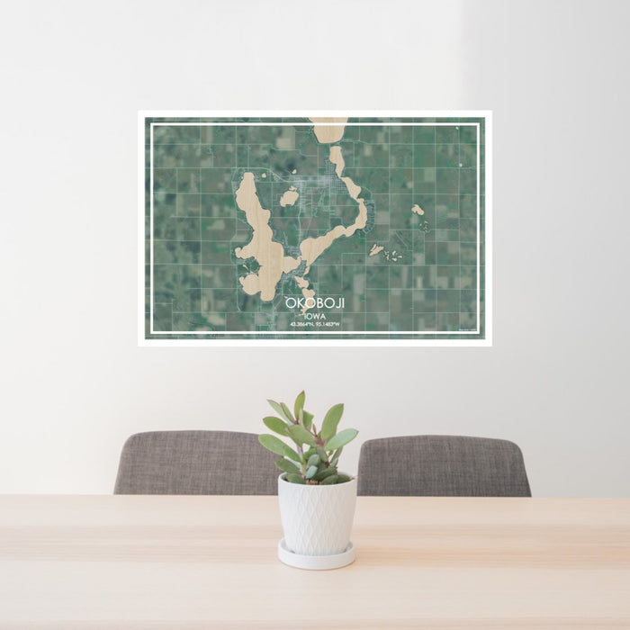 24x36 Okoboji Iowa Map Print Lanscape Orientation in Afternoon Style Behind 2 Chairs Table and Potted Plant
