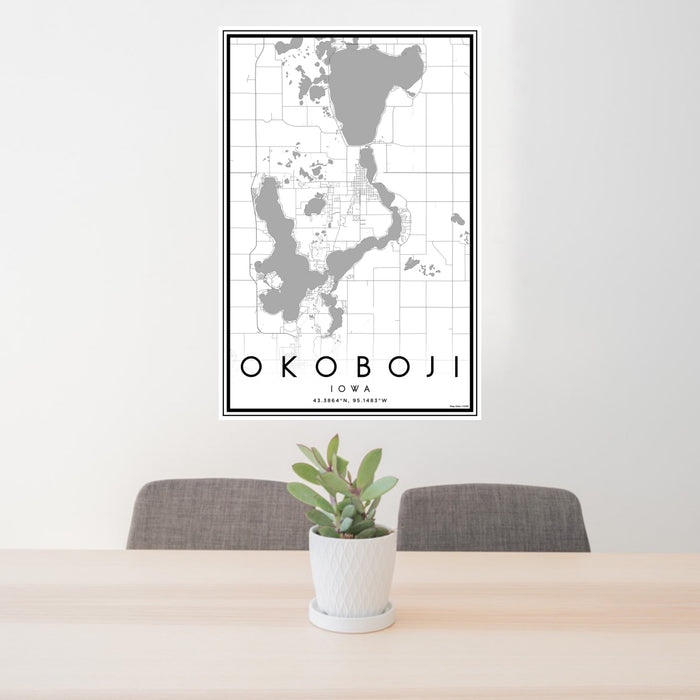 24x36 Okoboji Iowa Map Print Portrait Orientation in Classic Style Behind 2 Chairs Table and Potted Plant