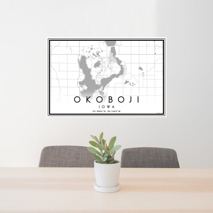 24x36 Okoboji Iowa Map Print Landscape Orientation in Classic Style Behind 2 Chairs Table and Potted Plant
