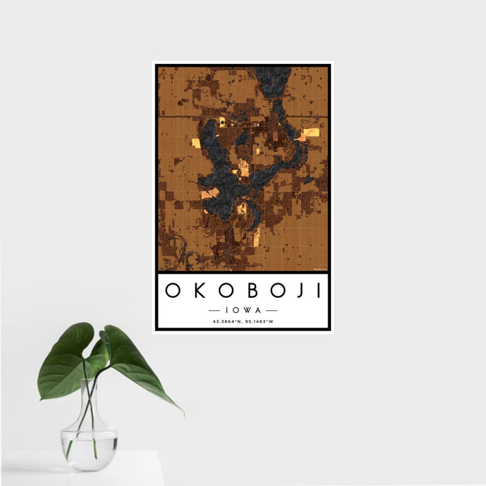 16x24 Okoboji Iowa Map Print Portrait Orientation in Ember Style With Tropical Plant Leaves in Water