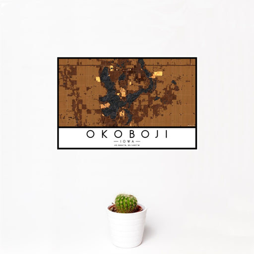 12x18 Okoboji Iowa Map Print Landscape Orientation in Ember Style With Small Cactus Plant in White Planter