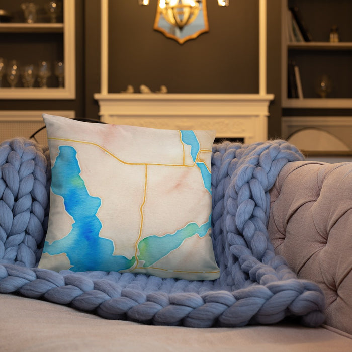 Custom Okoboji Iowa Map Throw Pillow in Watercolor on Cream Colored Couch