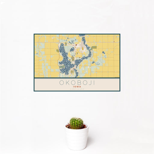 12x18 Okoboji Iowa Map Print Landscape Orientation in Woodblock Style With Small Cactus Plant in White Planter
