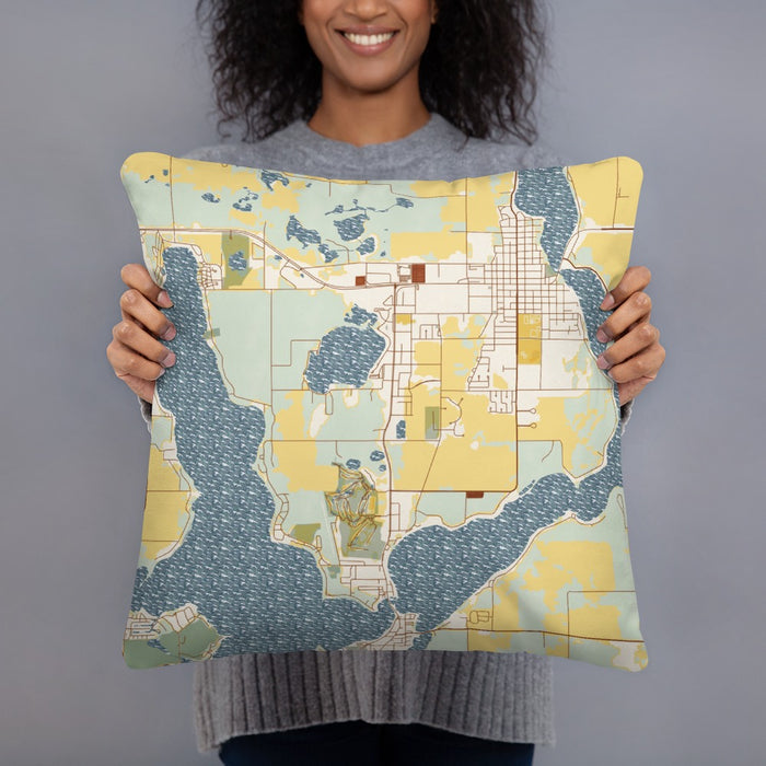Person holding 18x18 Custom Okoboji Iowa Map Throw Pillow in Woodblock
