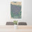 24x36 Olympic National Park Map Print Portrait Orientation in Afternoon Style Behind 2 Chairs Table and Potted Plant